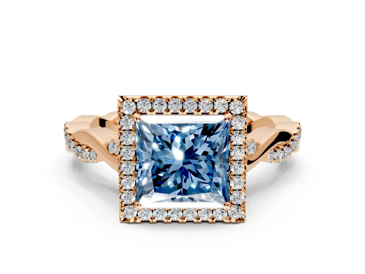 Halo Engagement Ring Setting for Fancy Blue Princess Cut Center with Twist Band and Prong Head in Rose Gold