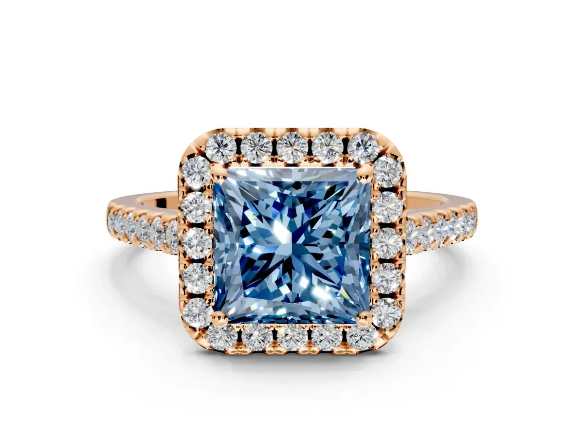 Halo Engagement Ring Setting for Fancy Blue Princess Cut Center with Narrowing Pave Band and Prong Head in Rose Gold