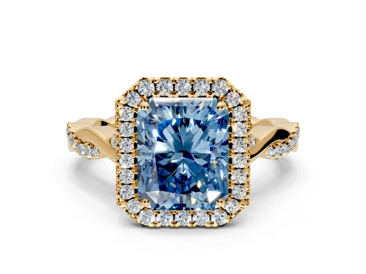 Halo Engagement Ring Setting for Fancy Blue Radiant Cut Center with Twist Band and Prong Head in Yellow Gold