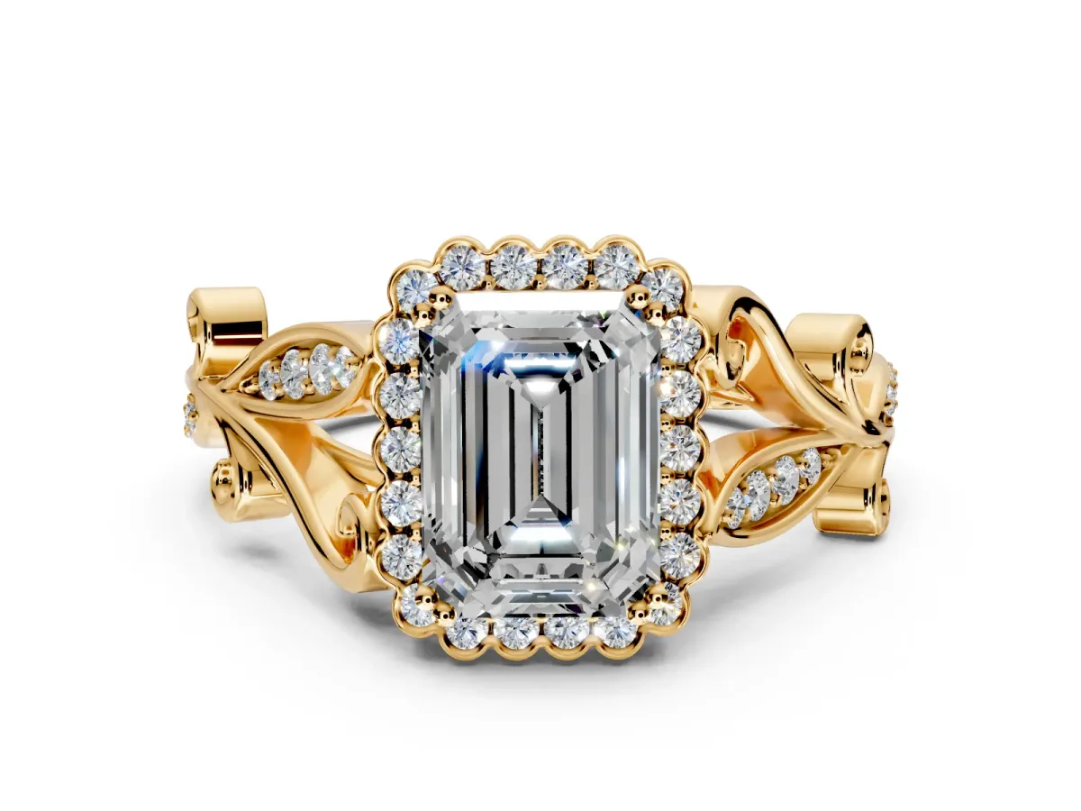 Halo Engagement Ring Setting for Emerald Cut Center with Leaf Motif Split Shank and Prong Head in Yellow Gold