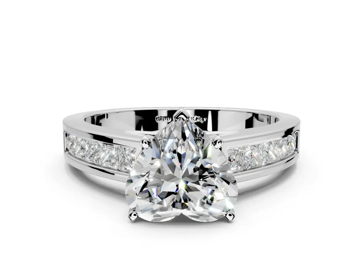 Solitaire Engagement Ring Setting for Heart-Shaped Center with Princess Cut Channel Band and Prong Head in Platinum