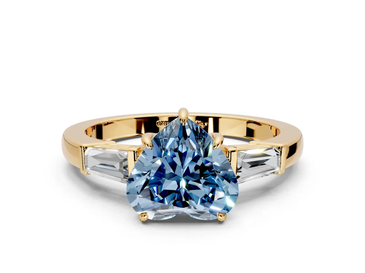 3 Stone Engagement Ring Setting for Fancy Blue Heart-Shaped Center with Baguette Accents and Prong Head in Yellow Gold