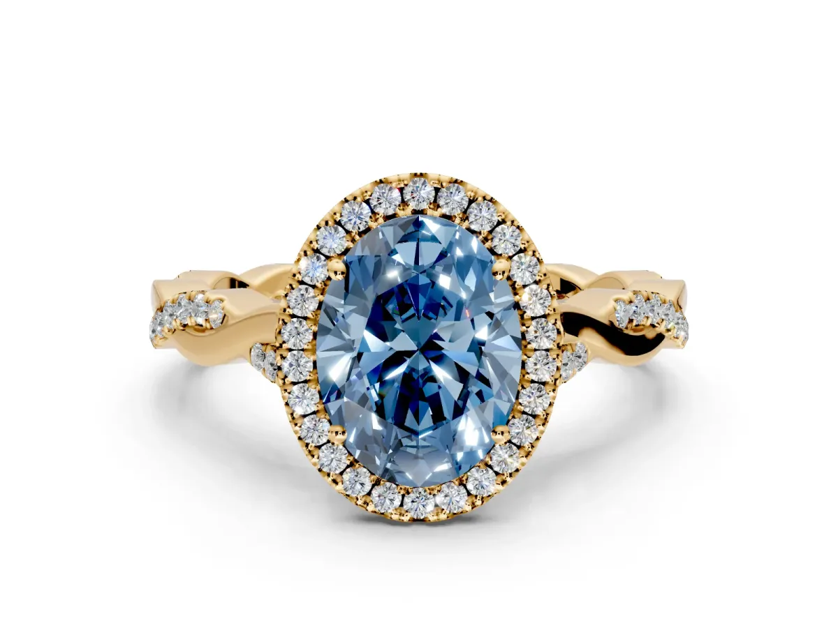 Halo Engagement Ring Setting for Fancy Blue Oval Center with Twist Band and Prong Head in Yellow Gold