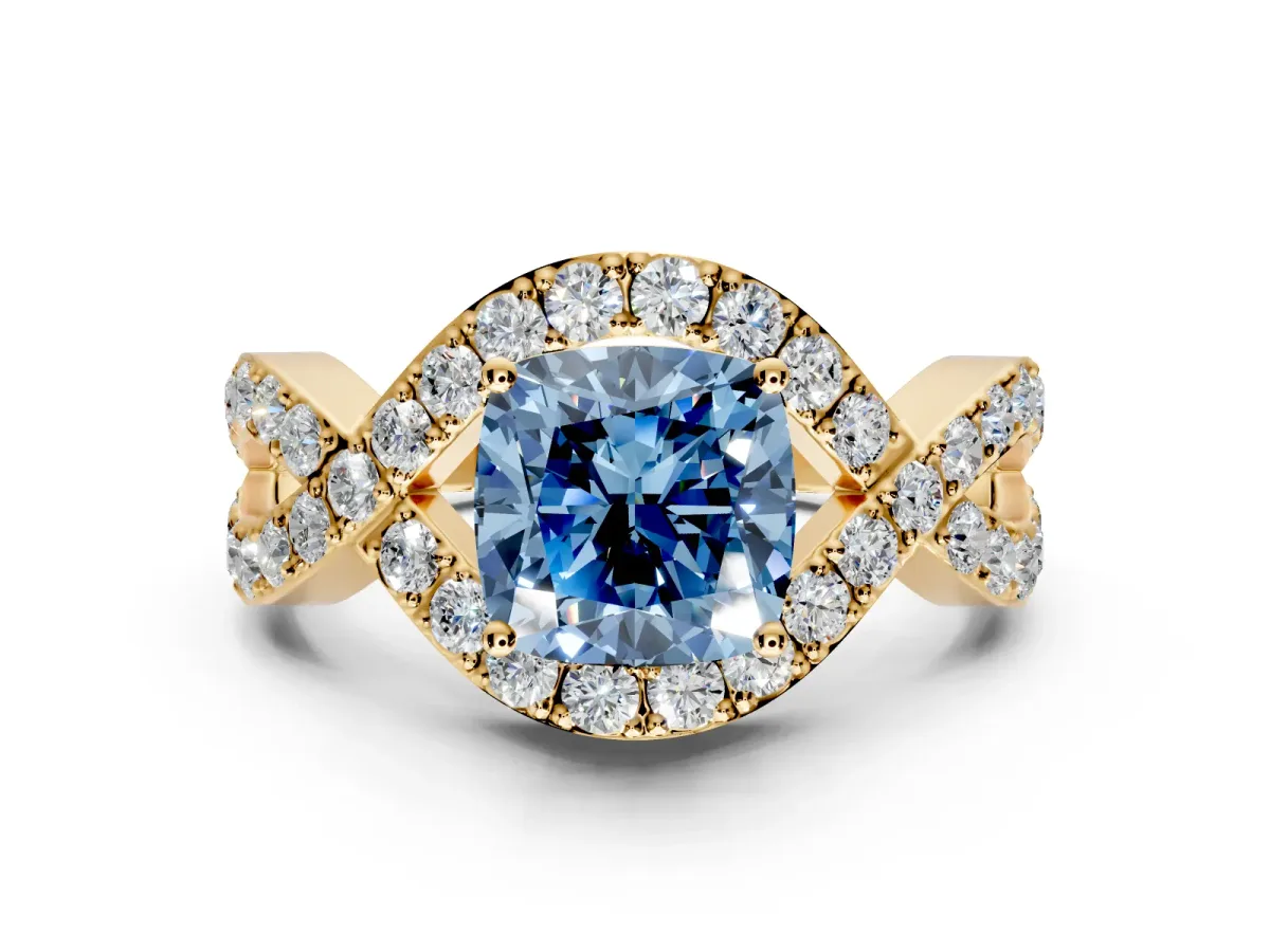 Halo Engagement Ring Setting for Fancy Blue Cushion Cut Center with Pave Infinity Twist Band and Prong Head in Yellow Gold
