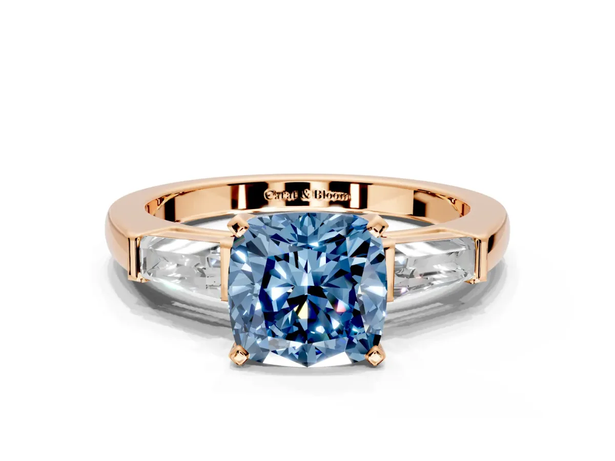 3 Stone Engagement Ring Setting for Fancy Blue Cushion Cut Center with Tapered Baguettes, Plain Band and Prong Head in Rose Gold