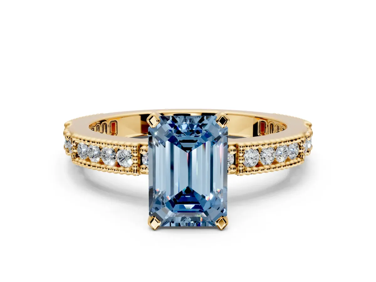 Solitaire Engagement Ring Setting for Fancy Blue Emerald Cut Center with Milgrain-Edged Pave Band and Prong Head in Yellow Gold