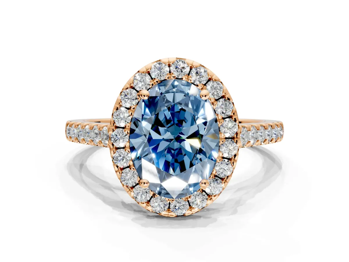 Halo Engagement Ring Setting for Fancy Blue Oval Center with Narrowing Pave Band and Prong Head in Rose Gold