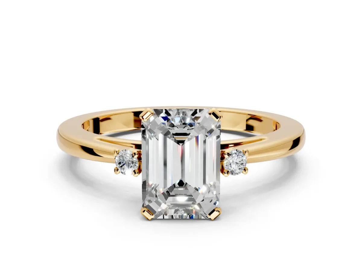 3 Stone Engagement Ring Setting for Emerald Cut Center with Low-Set Round Cut Accents and Prong Head in Yellow Gold