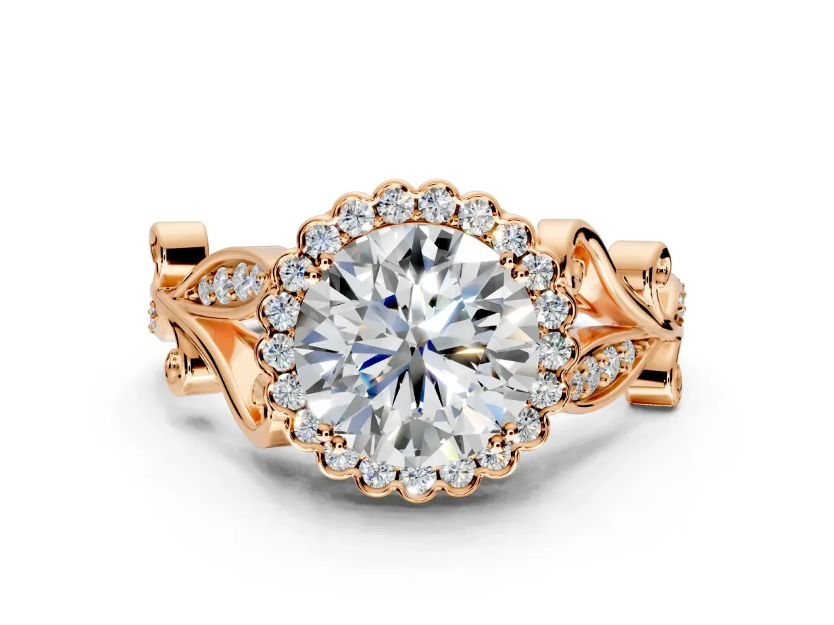Halo Engagement Ring Setting for Round Cut Center with Leaf Motif Split Shank and Prong Head in Rose Gold