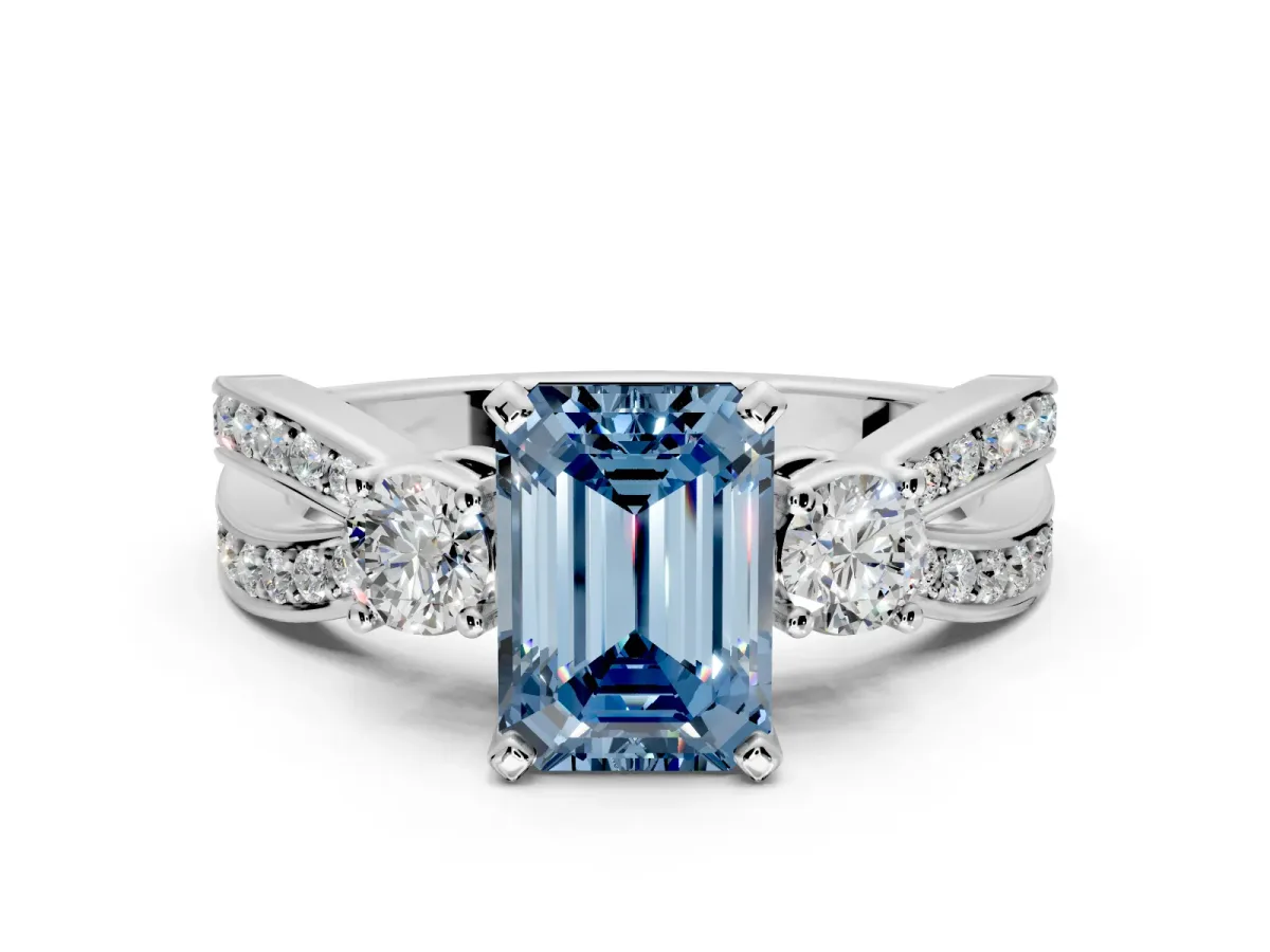 3 Stone Engagement Ring Setting for Fancy Blue Emerald Cut Center with Pave Twist Band and Prong Head in Platinum