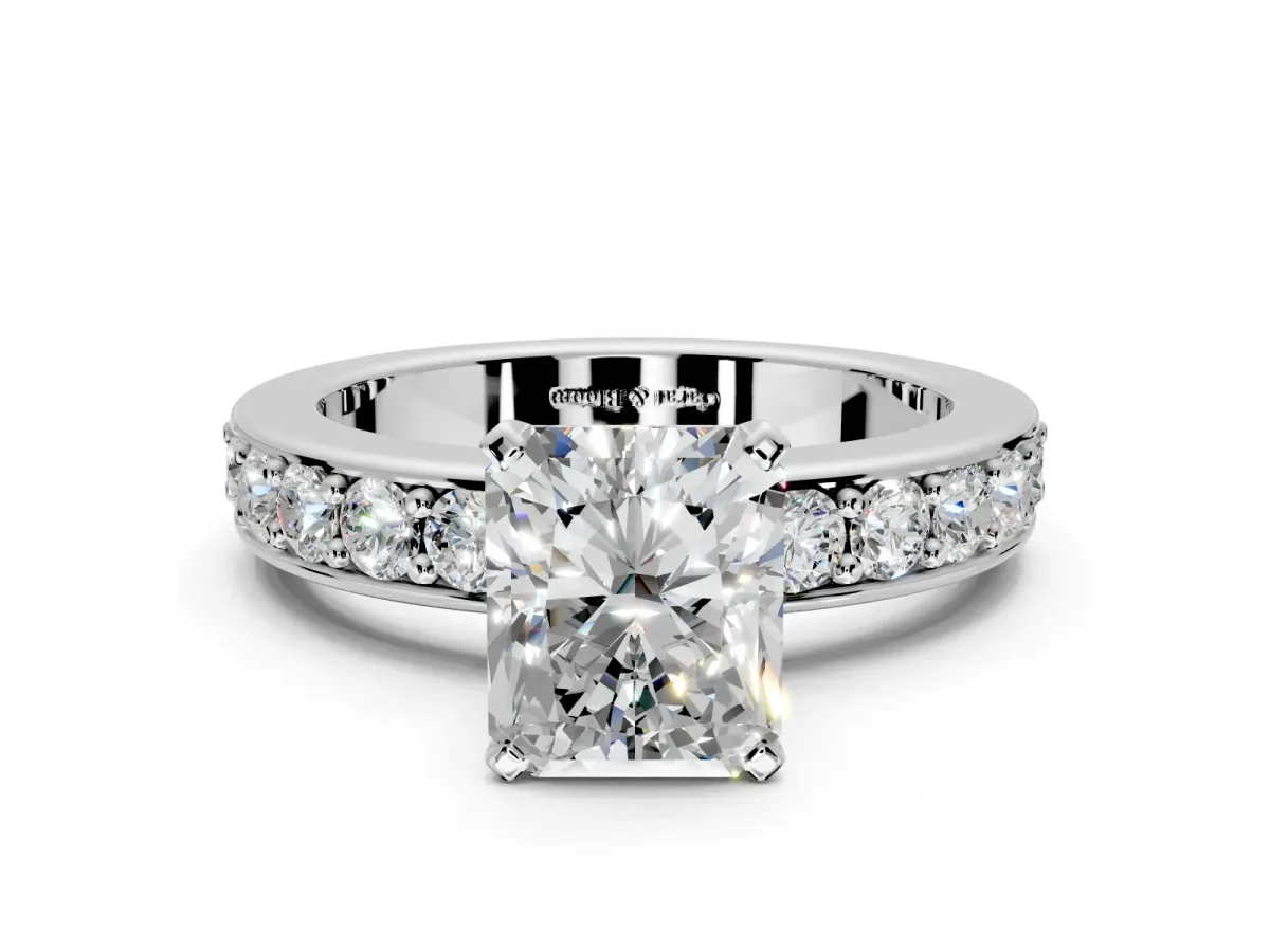 Solitaire Engagement Ring Setting for Radiant Cut Center with Channel-Set Accents and Prong Head in Platinum