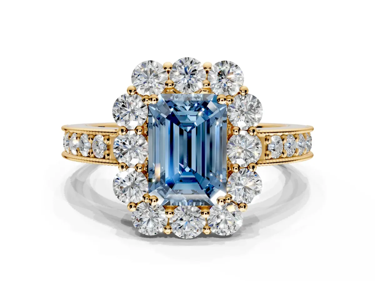 Halo Engagement Ring Setting for Fancy Blue Emerald Cut Center with Milgrain Channel Band and Prong Head in Yellow Gold
