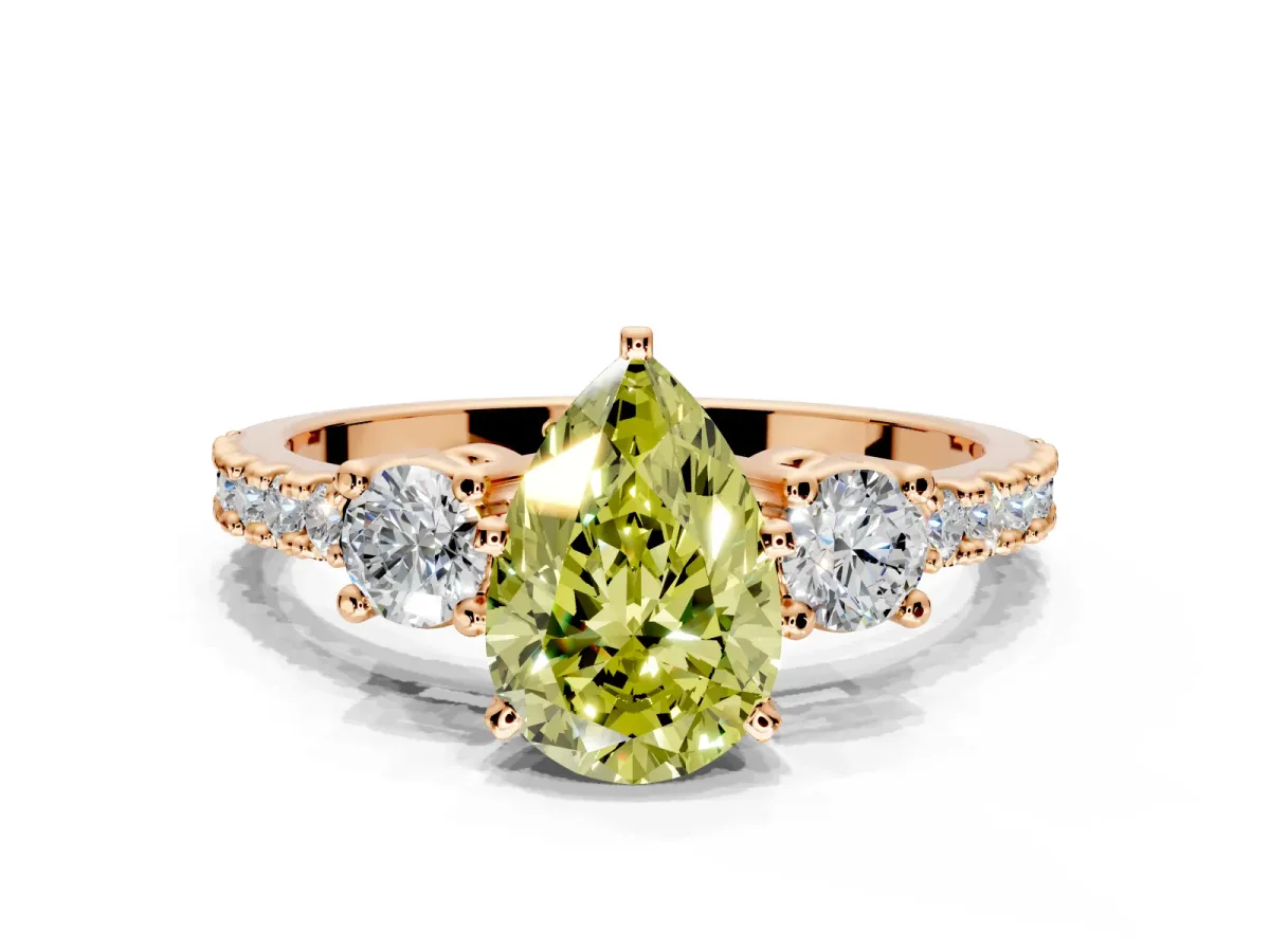 3 Stone Engagement Ring Setting for Fancy Yellow Pear-Shaped Center with Round Cut Side Accents and Prong Head in Rose Gold