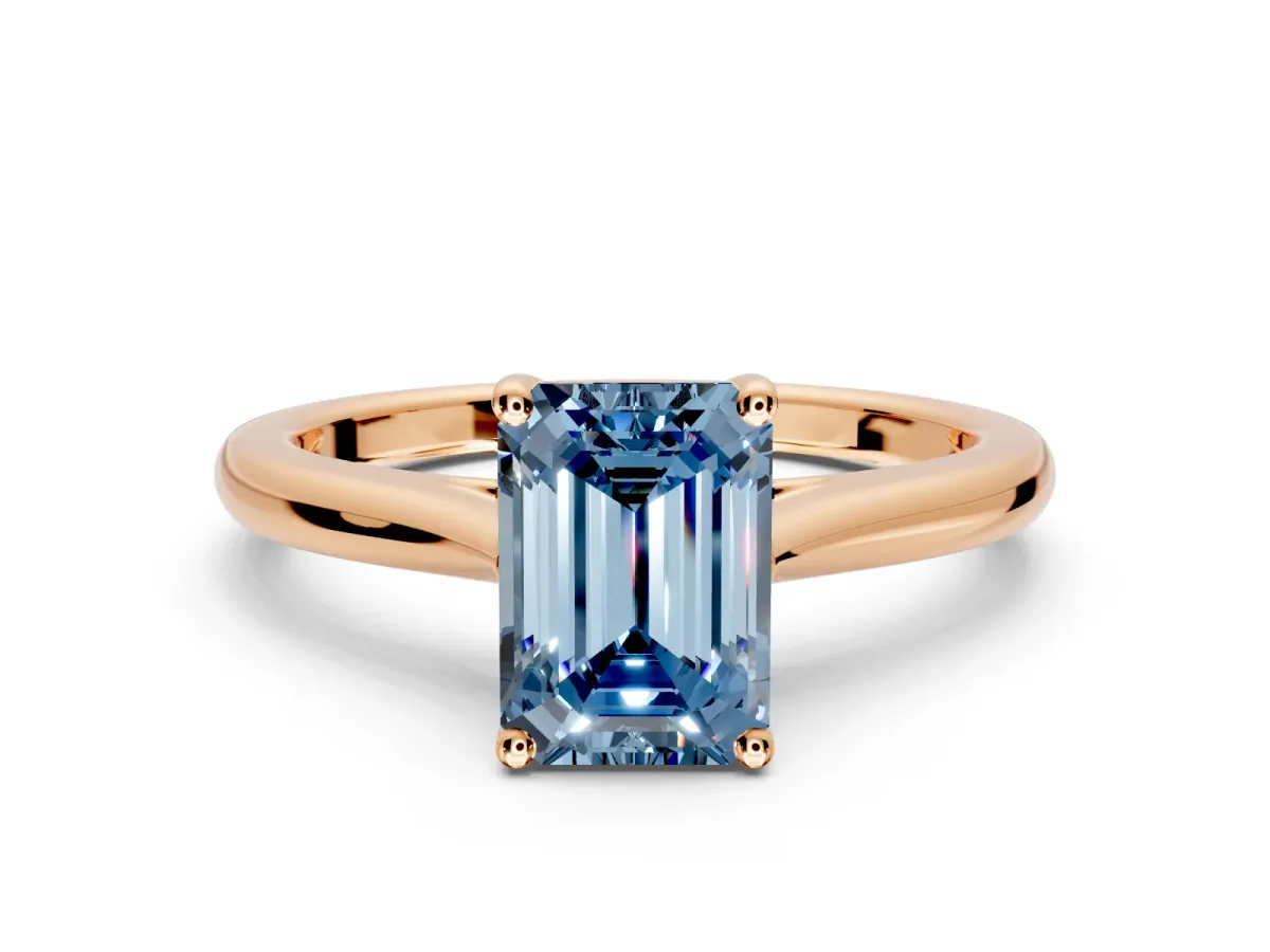 Solitaire Engagement Ring Setting for Fancy Blue Emerald Cut Center with Narrow Cathedral Band and Prong Head in Rose Gold