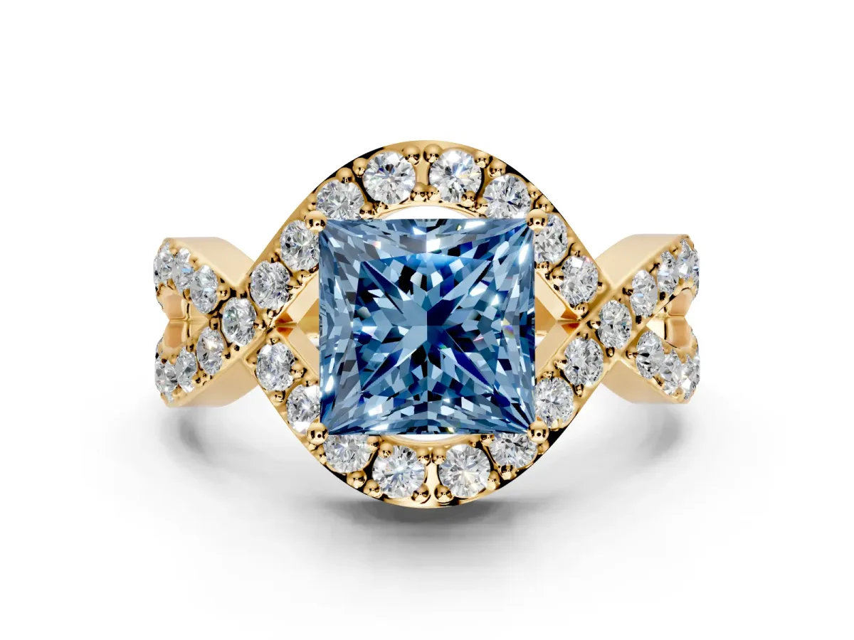 Halo Engagement Ring Setting for Fancy Blue Princess Cut Center with Pave Infinity Twist Band and Prong Head in Yellow Gold