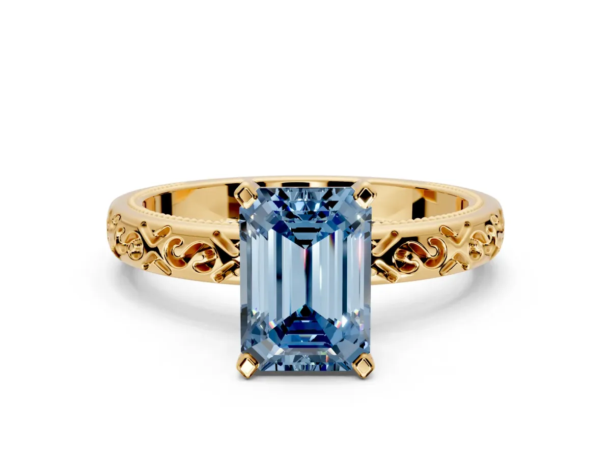 Solitaire Engagement Ring Setting for Fancy Blue Emerald Cut Center with Scrollwork Band and Prong Head in Yellow Gold