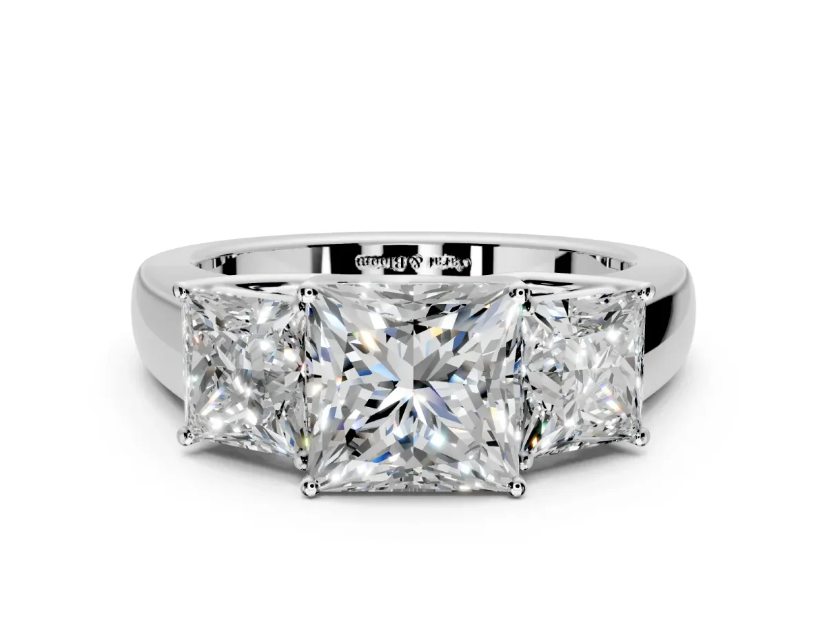3 Stone Engagement Ring Setting for Princess Cut Center with Raised Basket Heads and Prong Head in Platinum