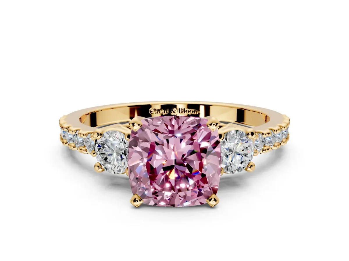 3 Stone Engagement Ring Setting for Fancy Pink Cushion Cut Center with Round Cut Side Accents and Prong Head in Yellow Gold