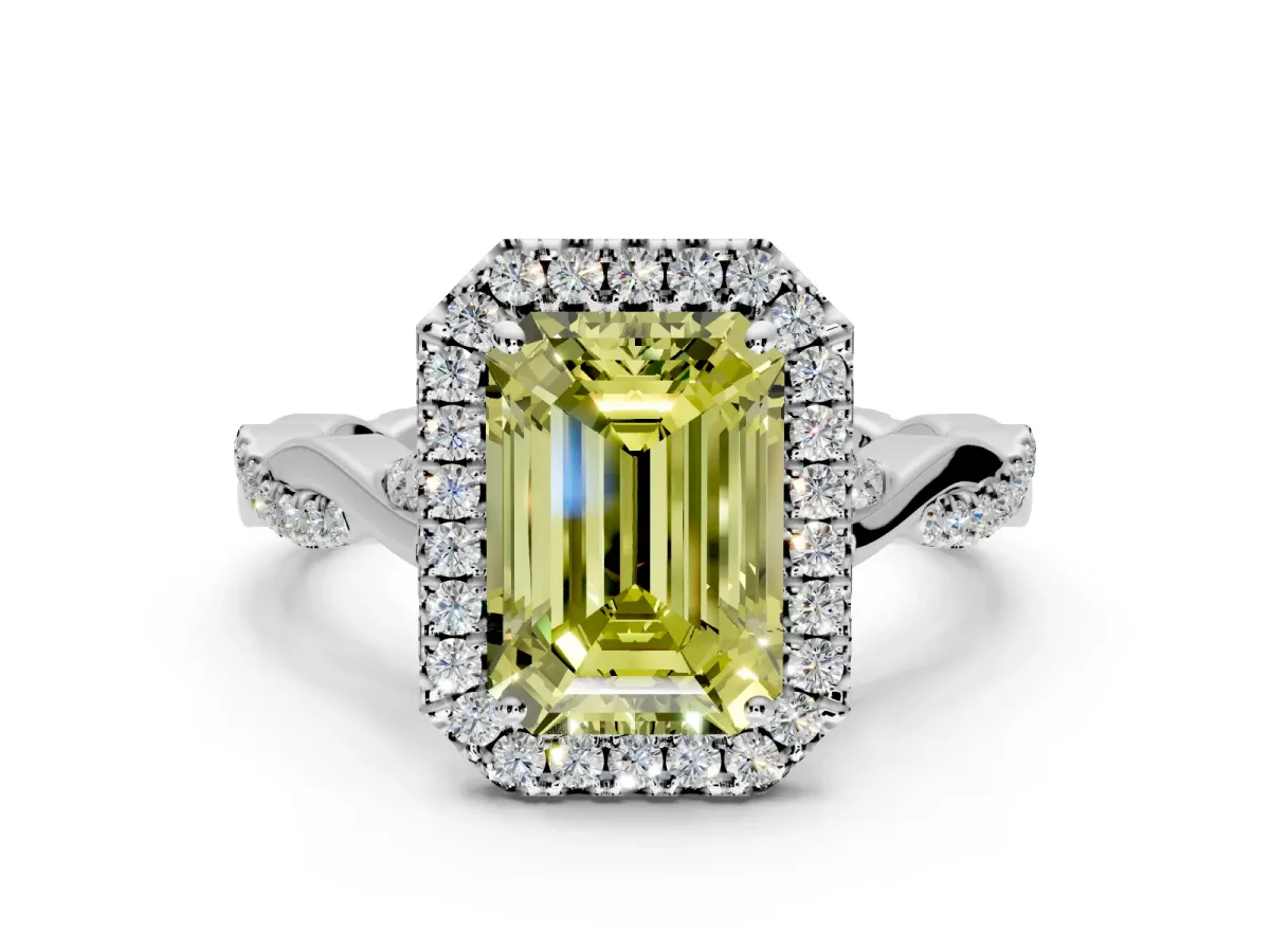 Halo Engagement Ring Setting for Fancy Yellow Emerald Cut Center with Twist Band and Prong Head in White Gold