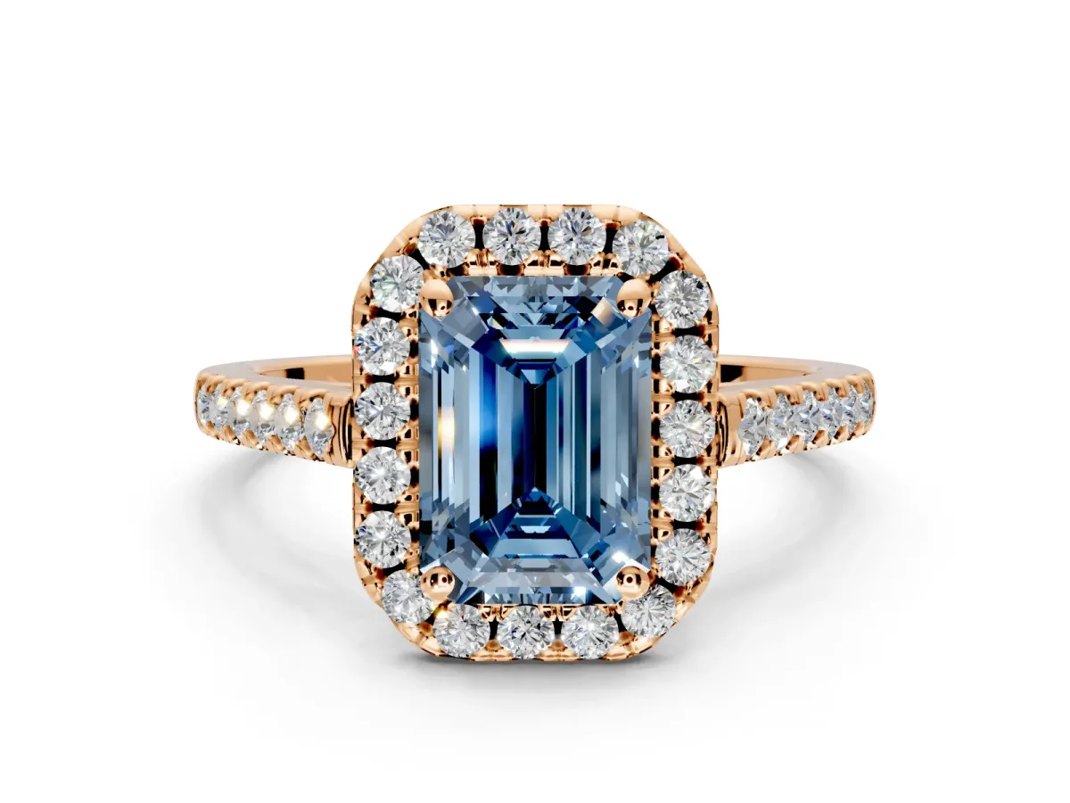 Halo Engagement Ring Setting for Fancy Blue Emerald Cut Center with Raised Halo, Pave Band and Prong Head in Rose Gold