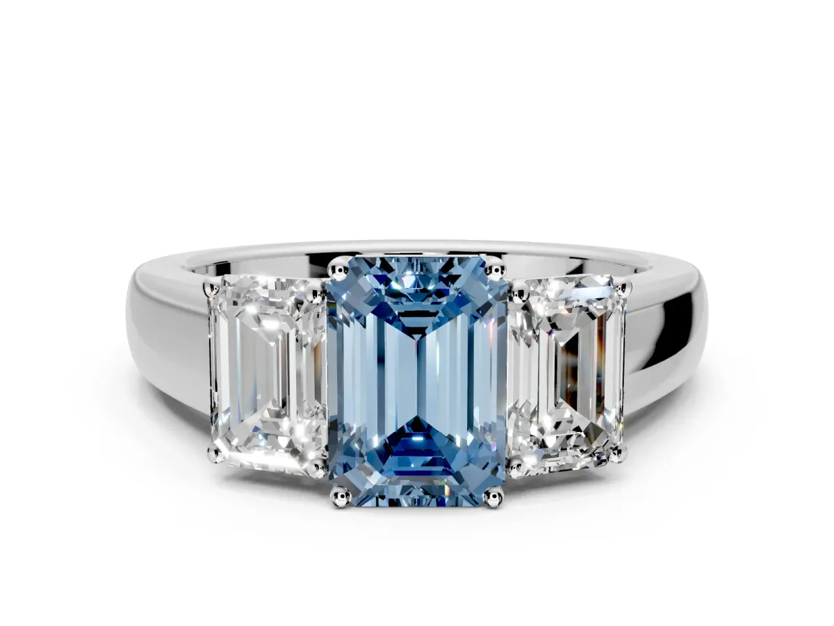3 Stone Engagement Ring Setting for Fancy Blue Emerald Cut Center with Raised Basket Heads and Prong Head in Platinum