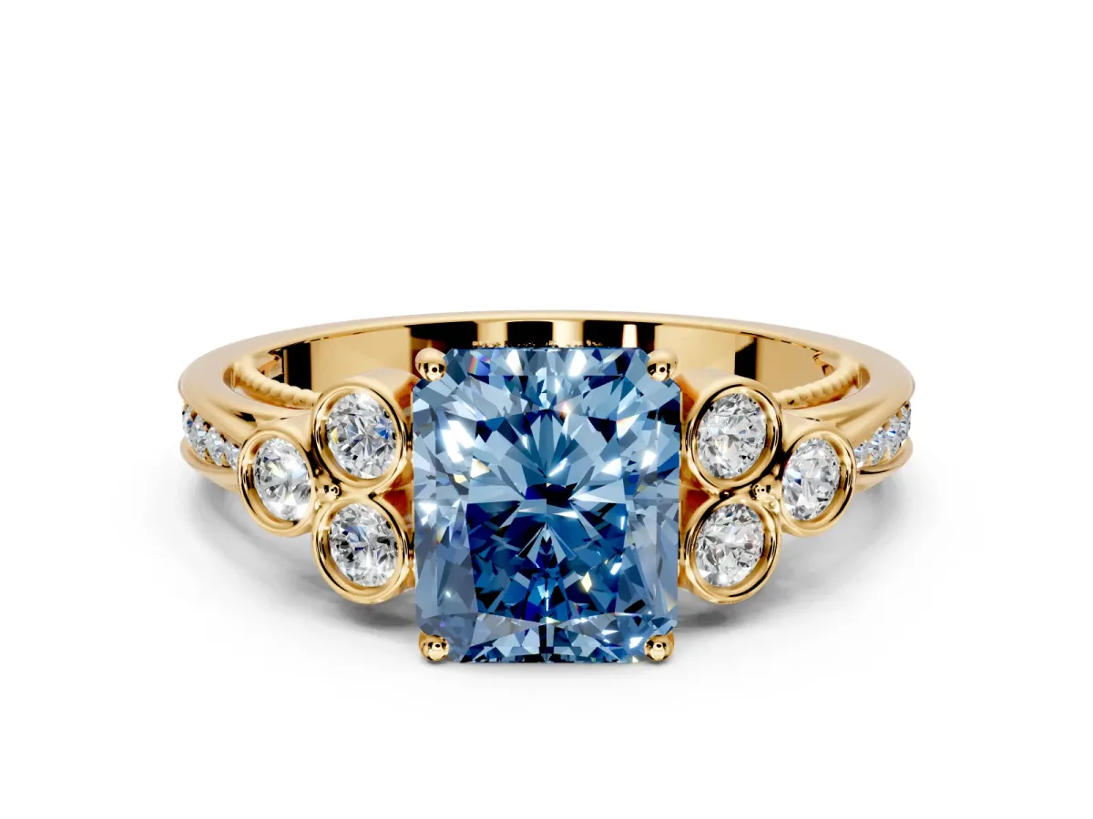 Cluster Engagement Ring Setting for Fancy Blue Radiant Cut Center with Bezel Accent Clusters and Prong Head in Yellow Gold