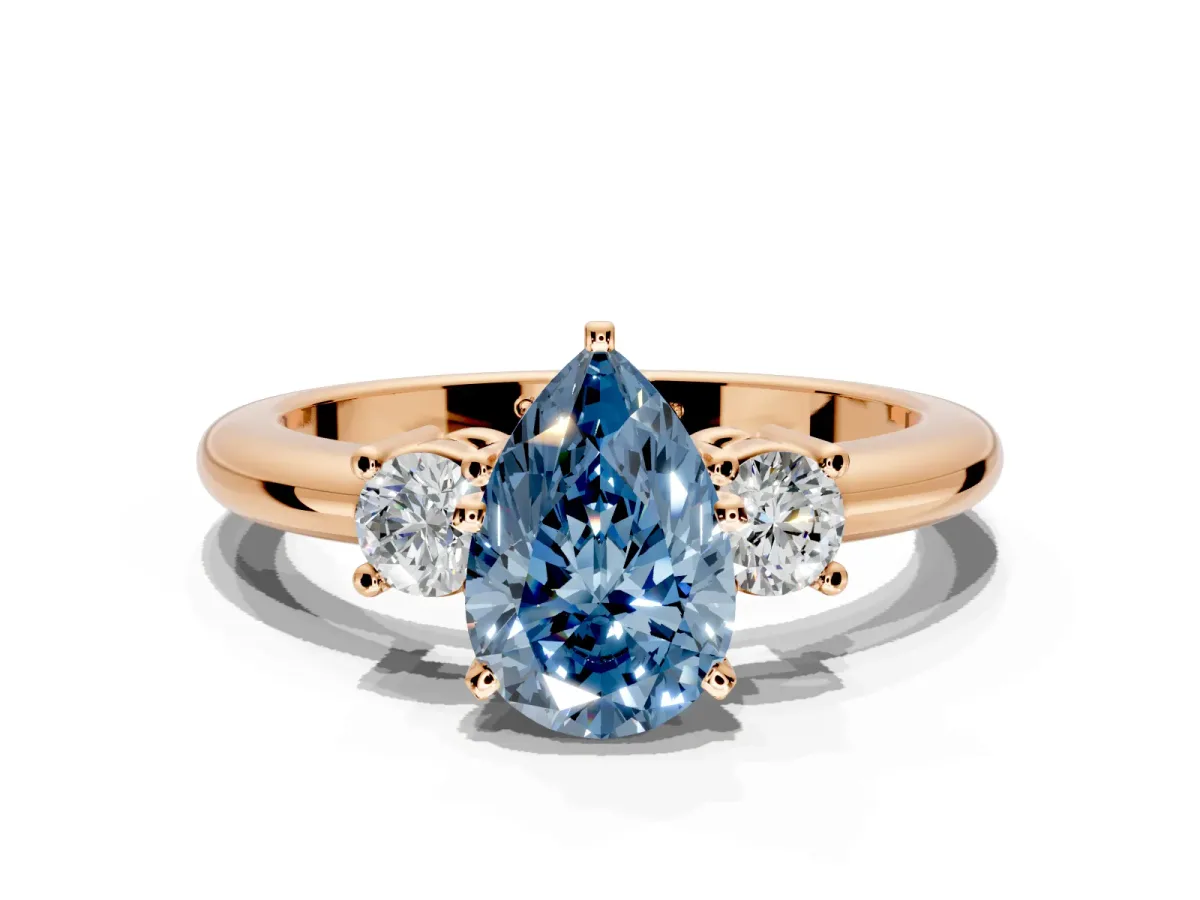 3 Stone Engagement Ring Setting for Fancy Blue Pear-Shaped Center with Wide Plain Band and Prong Head in Rose Gold