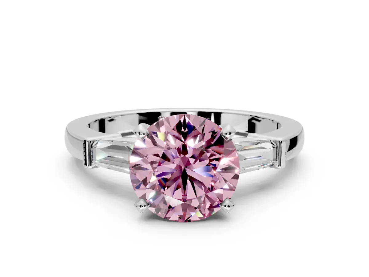 3 Stone Engagement Ring Setting for Fancy Pink Round Cut Center with Channel Baguette Accents and Prong Head in White Gold