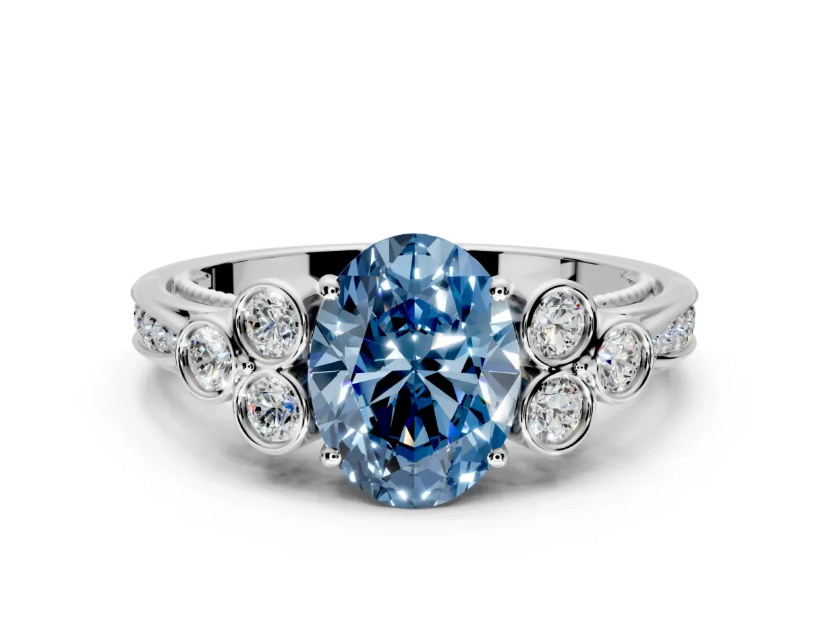 Cluster Engagement Ring Setting for Fancy Blue Oval Center with Bezel Accent Clusters and Prong Head in White Gold