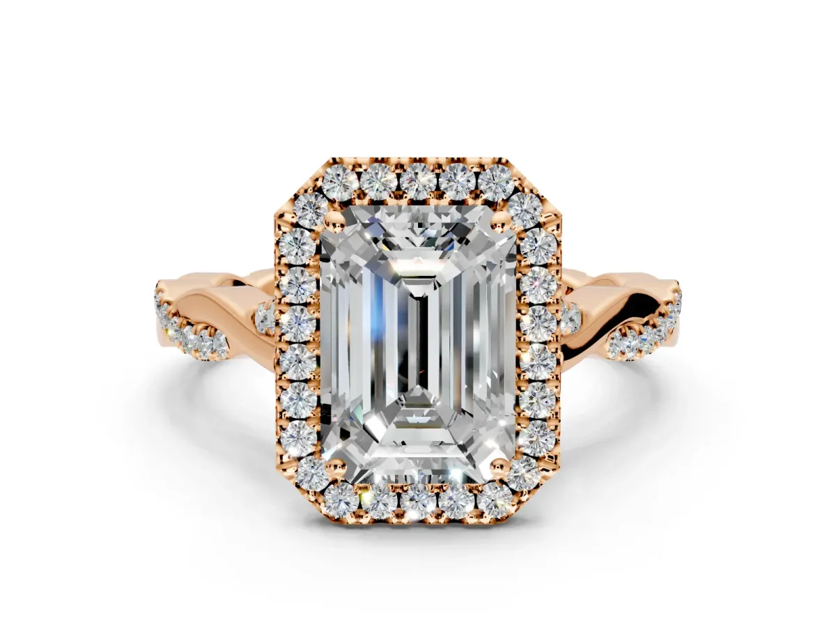 Halo Engagement Ring Setting for Emerald Cut Center with Twist Band and Prong Head in Rose Gold