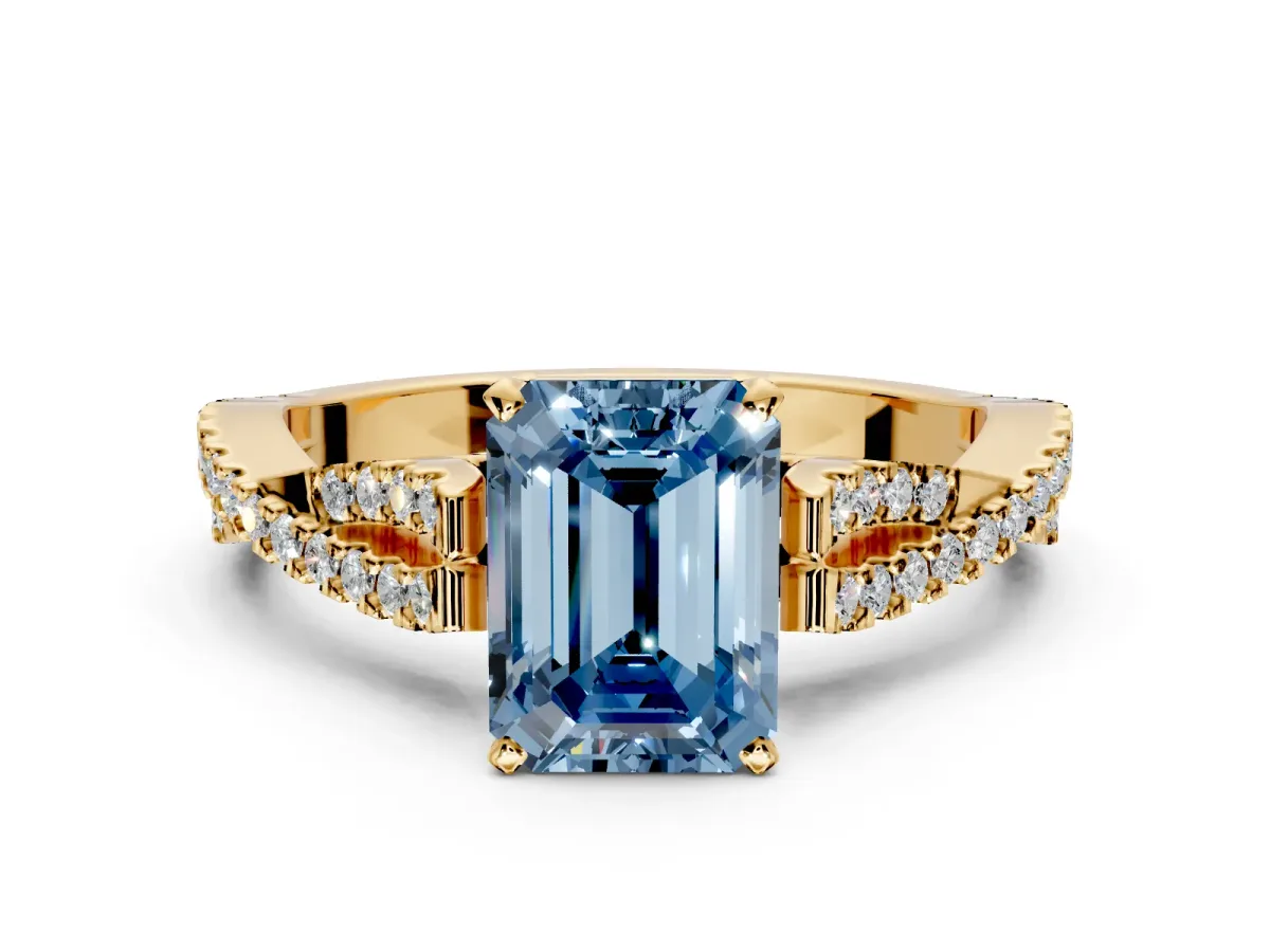 Solitaire Engagement Ring Setting for Fancy Blue Emerald Cut Center with Twisted Pave Split Shank and Prong Head in Yellow Gold