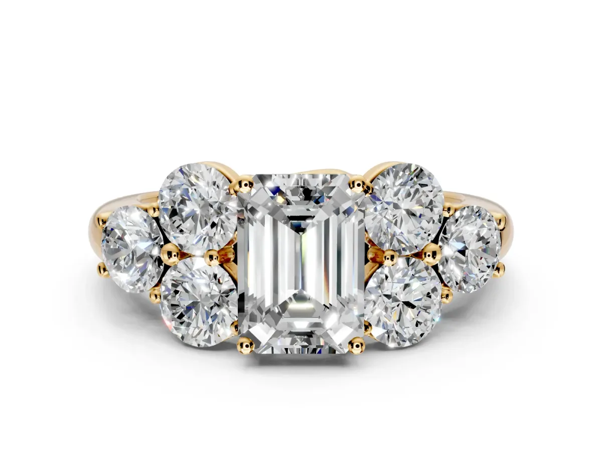 Cluster Engagement Ring Setting for Emerald Cut Center with Round Cut Accent Frame and Prong Head in Yellow Gold
