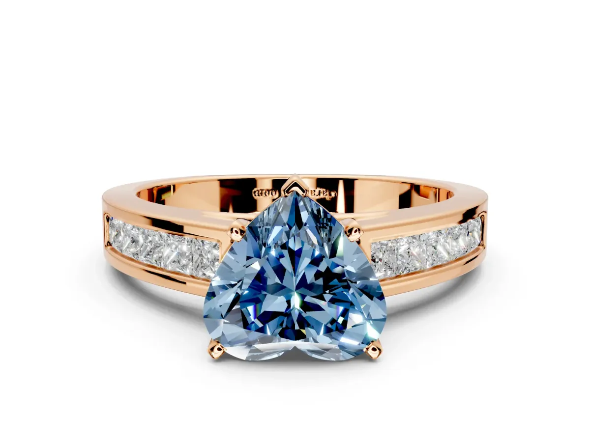 Solitaire Engagement Ring Setting for Fancy Blue Heart-Shaped Center with Princess Cut Channel Band and Prong Head in Rose Gold