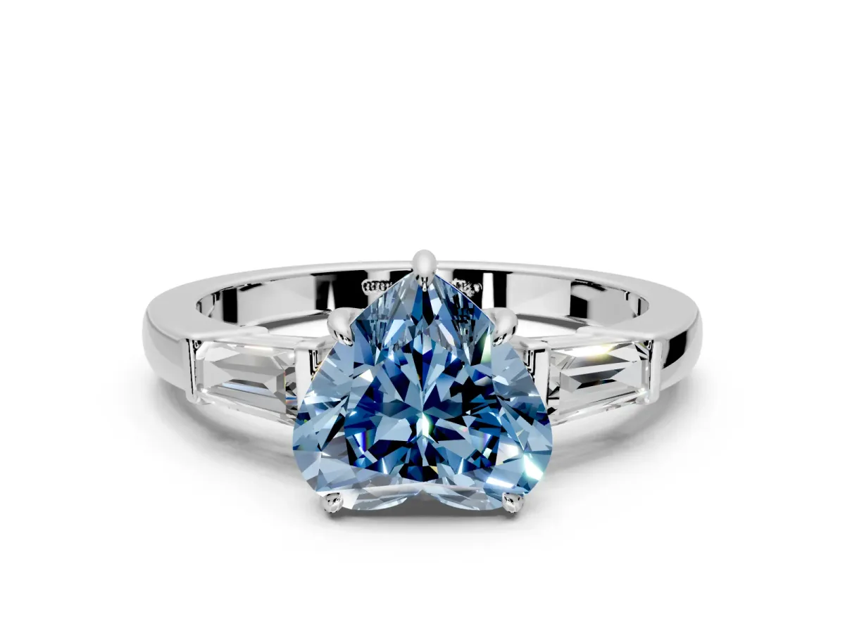 3 Stone Engagement Ring Setting for Fancy Blue Heart-Shaped Center with Baguette Accents and Prong Head in White Gold