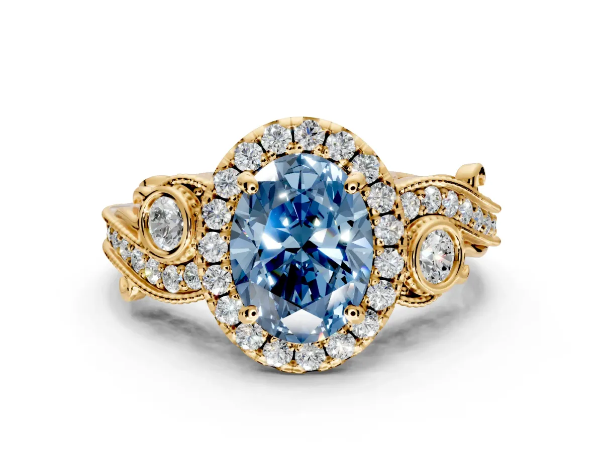 Milgrain Halo Engagement Ring Setting for Fancy Blue Oval Center with Shoulder Bezels and Prong Head in Yellow Gold