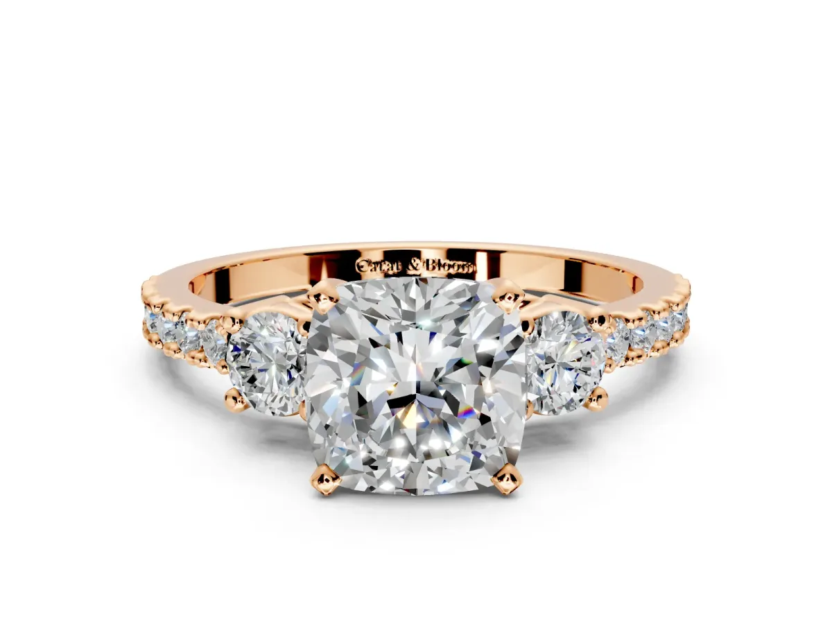 3 Stone Engagement Ring Setting for Cushion Cut Center with Round Cut Side Accents and Prong Head in Rose Gold