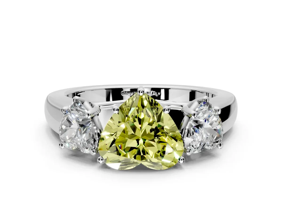 3 Stone Engagement Ring Setting for Fancy Yellow Heart-Shaped Center with Raised Basket Heads and Prong Head in Platinum