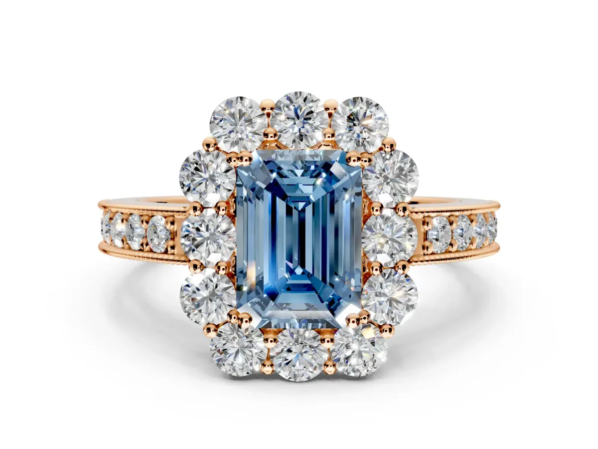 Halo Engagement Ring Setting for Fancy Blue Emerald Cut Center with Milgrain Channel Band and Prong Head in Rose Gold