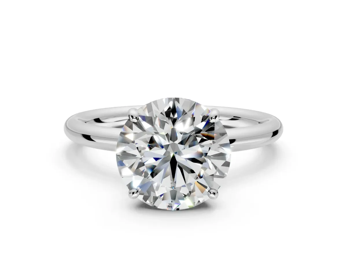 Low-Set Solitaire Engagement Ring Setting for Round Cut Center with Thin Plain Band and Prong Head in Platinum