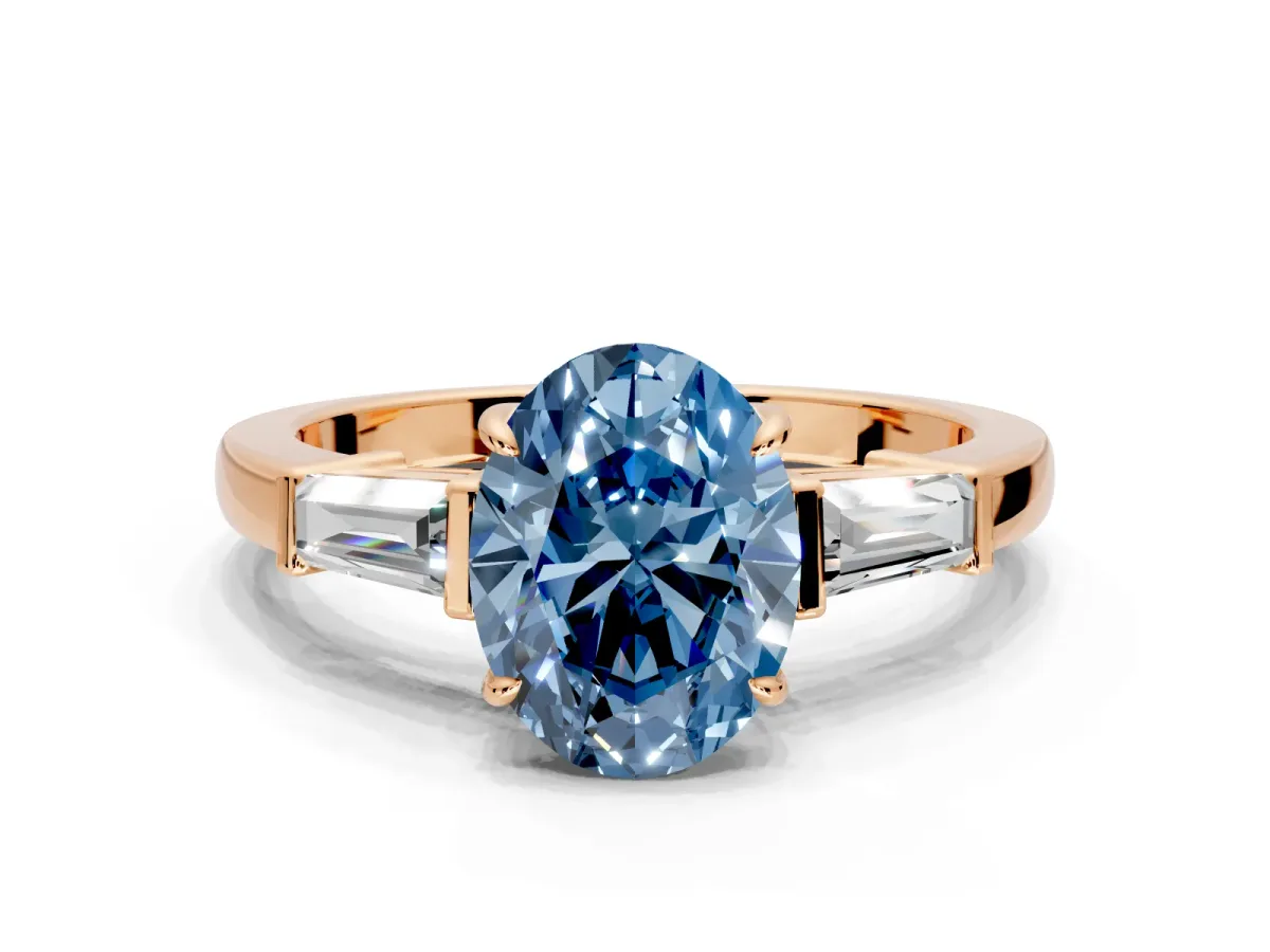 3 Stone Engagement Ring Setting for Fancy Blue Oval Center with Baguette Accents and Prong Head in Rose Gold