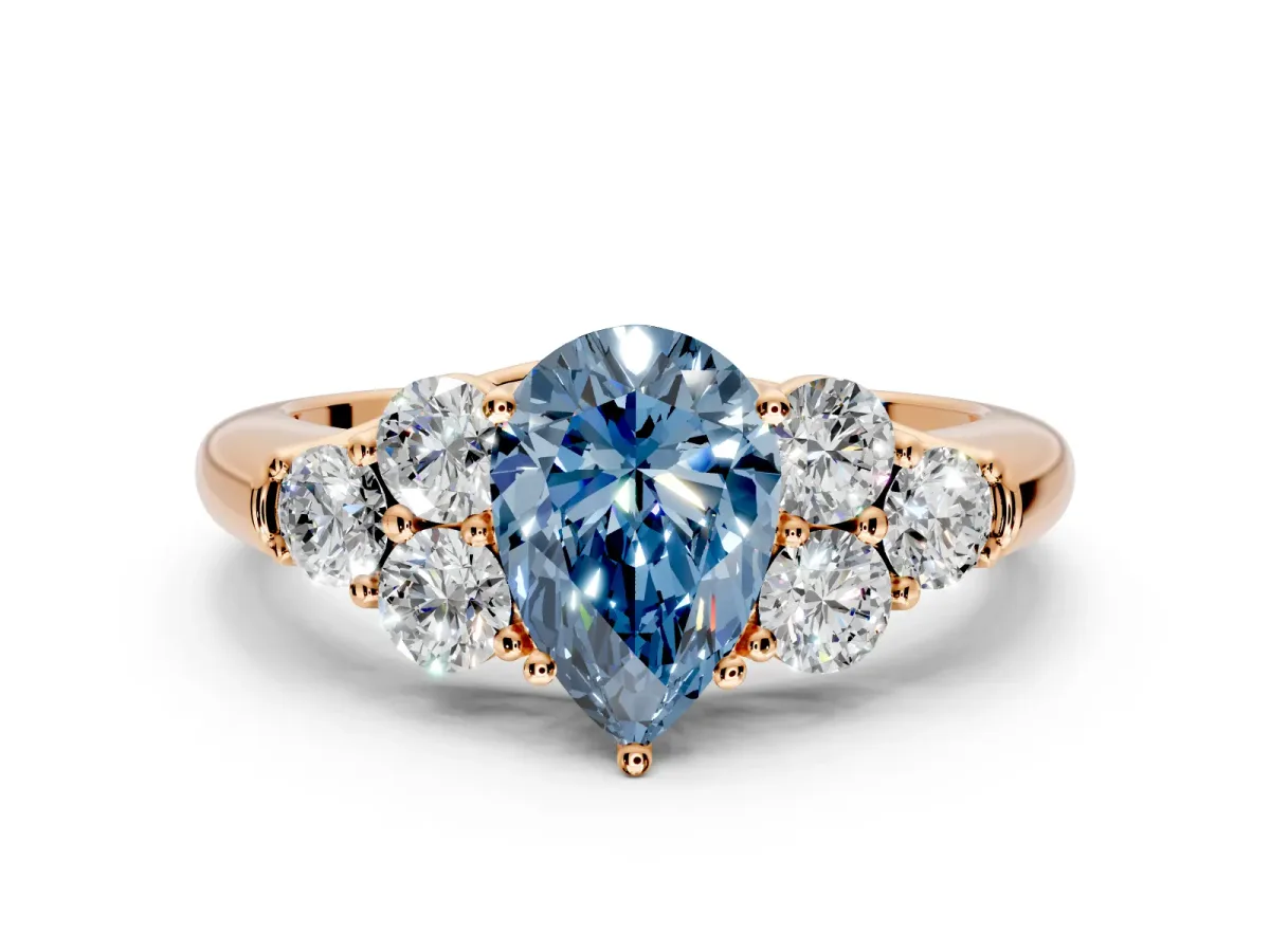 Cluster Engagement Ring Setting for Fancy Blue Pear-Shaped Center with Round Cut Accent Frame and Prong Head in Rose Gold