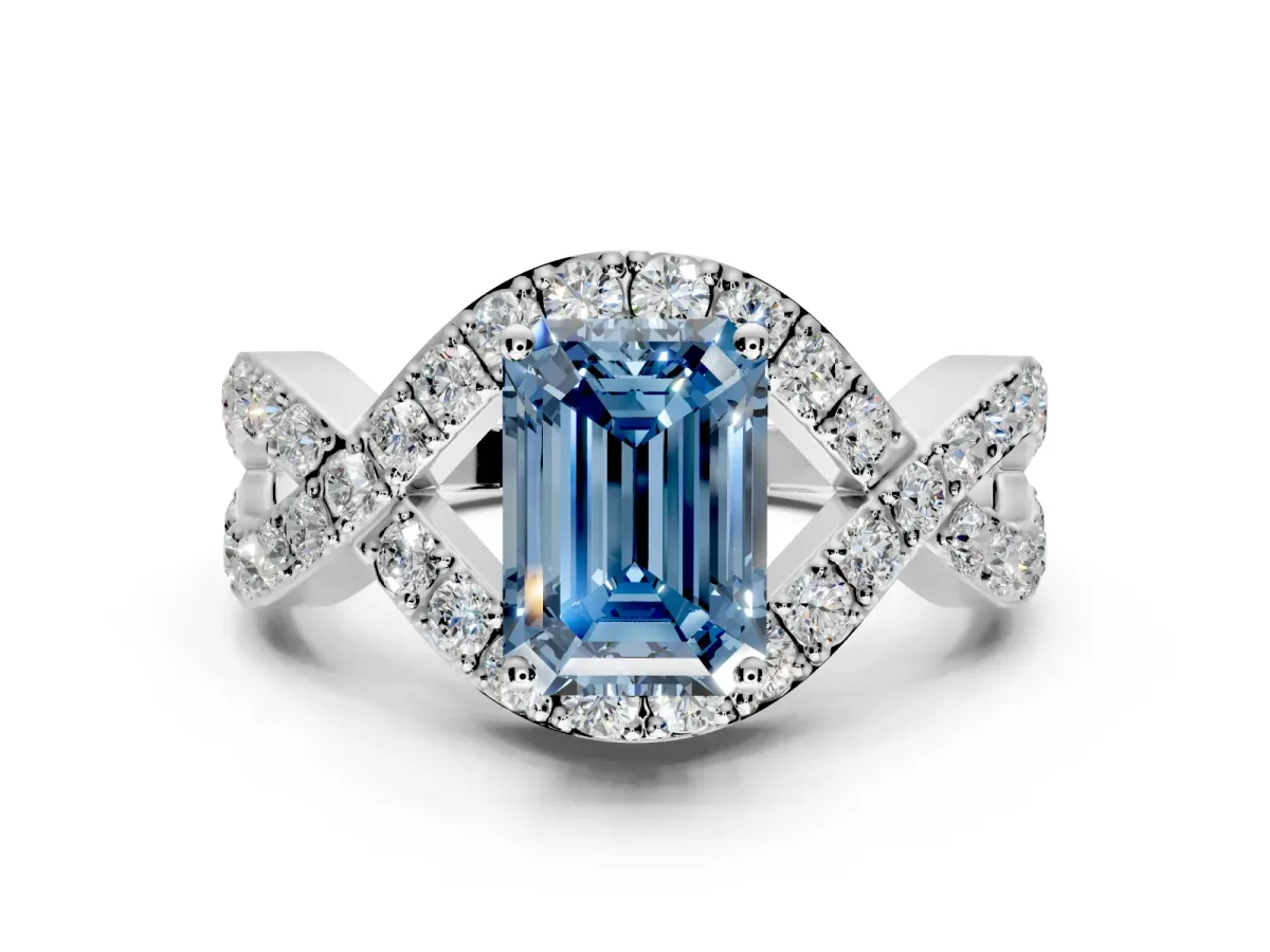 Halo Engagement Ring Setting for Fancy Blue Emerald Cut Center with Pave Infinity Twist Band and Prong Head in Sterling Silver