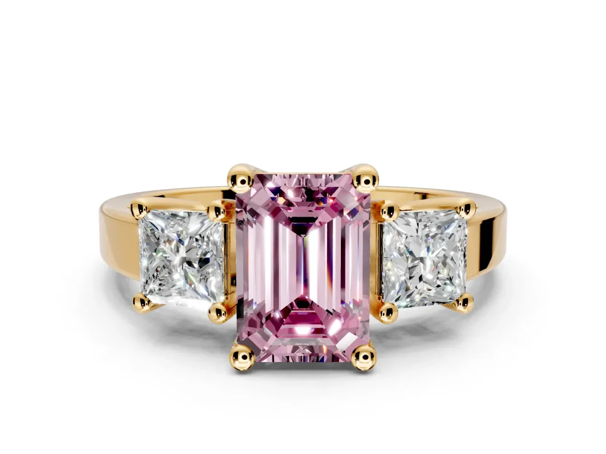 3 Stone Engagement Ring Setting for Fancy Pink Emerald Cut Center with Matching Side Accents and Prong Head in Yellow Gold