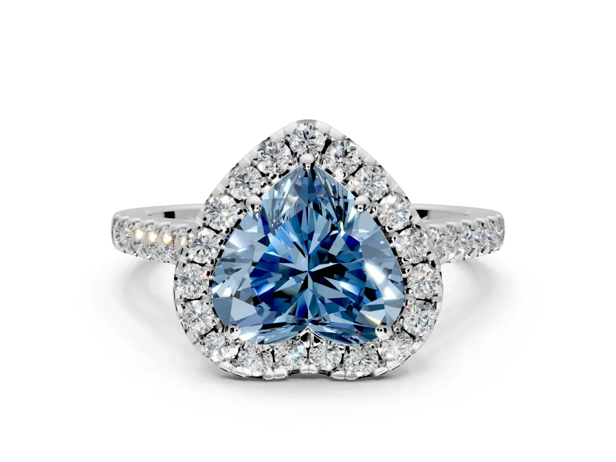 Halo Engagement Ring Setting for Fancy Blue Heart-Shaped Center with Narrowing Pave Band and Prong Head in White Gold