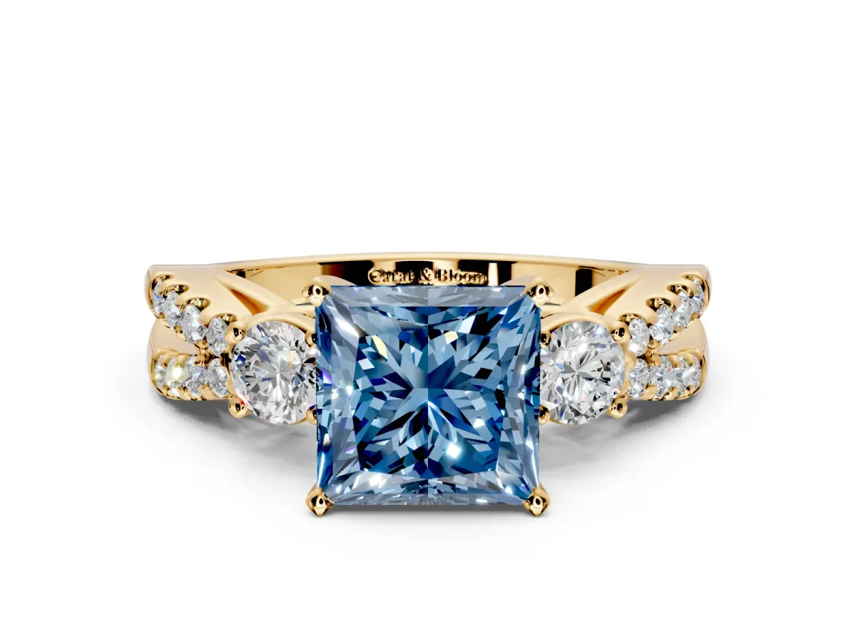 3 Stone Engagement Ring Setting for Fancy Blue Princess Cut Center with Pave Split Shank and Prong Head in Yellow Gold