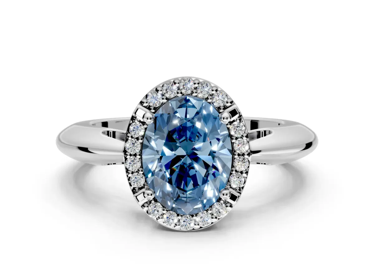 Halo Engagement Ring Setting for Fancy Blue Oval Center with Tapered Plain Band and Prong Head in Platinum