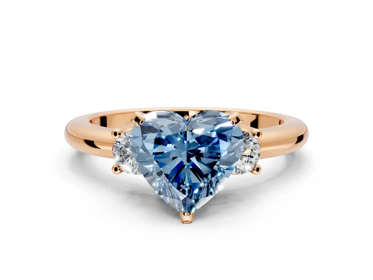 3 Stone Engagement Ring Setting for Fancy Blue Heart-Shaped Center with Wide Plain Band and Prong Head in Rose Gold