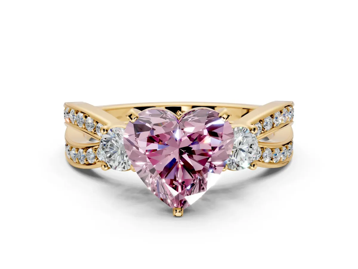3 Stone Engagement Ring Setting for Fancy Pink Heart-Shaped Center with Pave Twist Band and Prong Head in Yellow Gold