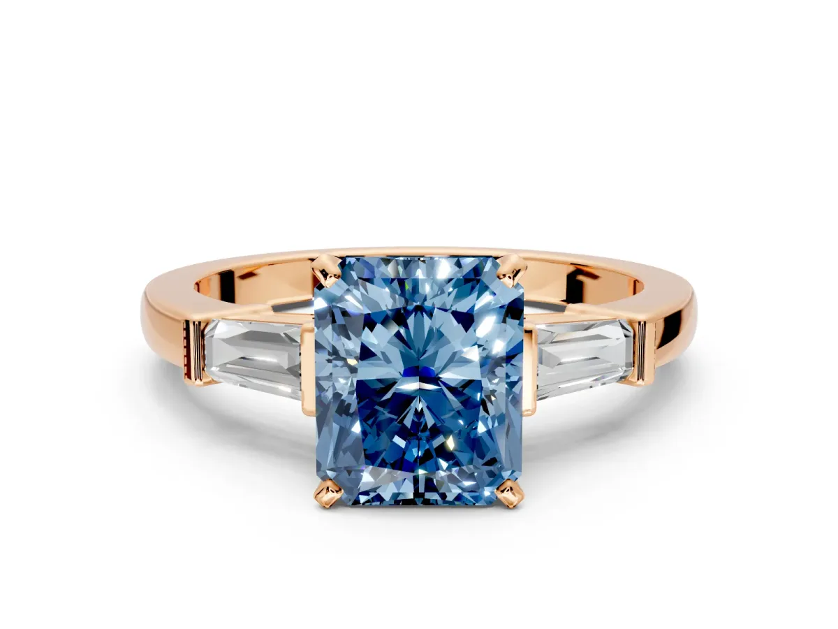 3 Stone Engagement Ring Setting for Fancy Blue Radiant Cut Center with Channel Baguette Accents and Prong Head in Rose Gold