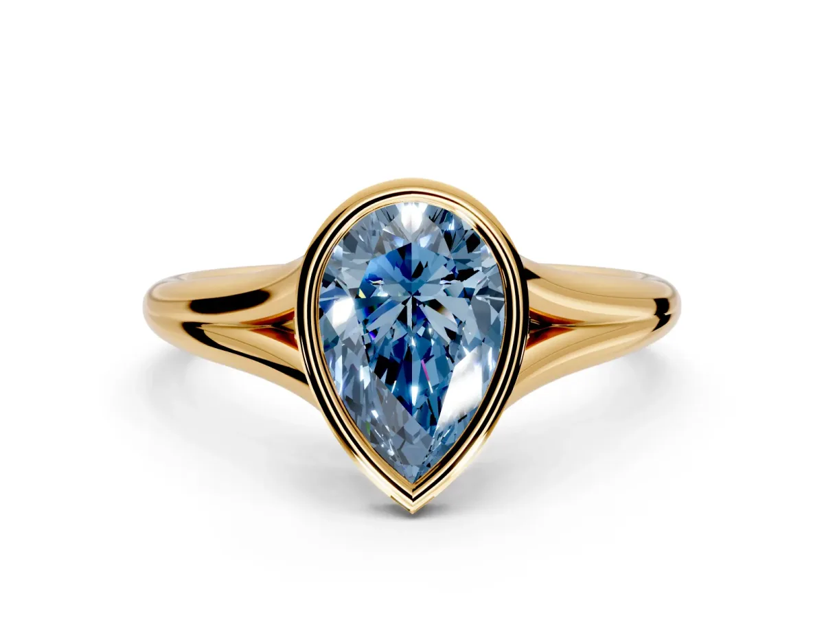 Solitaire Engagement Ring Setting for Fancy Blue Pear-Shaped Center with V Split Shank and Bezel Head in Yellow Gold